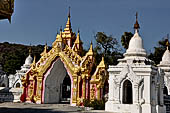 Myanmar - Mandalay, Kuthodaw Pagoda. 729 white pitaka pagodas contain the Tipitaka, the sacred texts of Theravada Buddhism. 